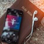 bible with phone and headphones,Concept listen worship song.